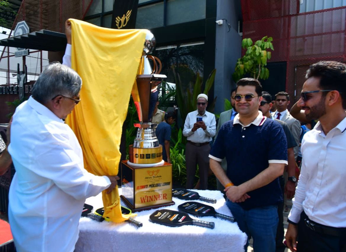 CA Abhay Bhutada and Honourable Minister, Shri Chandrakant (Dada) Patil, Minister of Higher & Technical Education and Parliamentary Affairs unveiling the winning trophy of the Ultimate Pickleball League